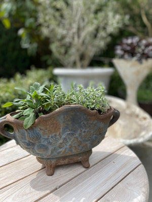 
                  
                    Small Footed Cast Iron Pot
                  
                