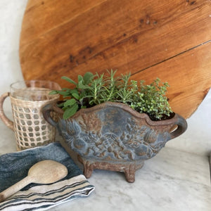 
                  
                    Small Footed Cast Iron Pot
                  
                