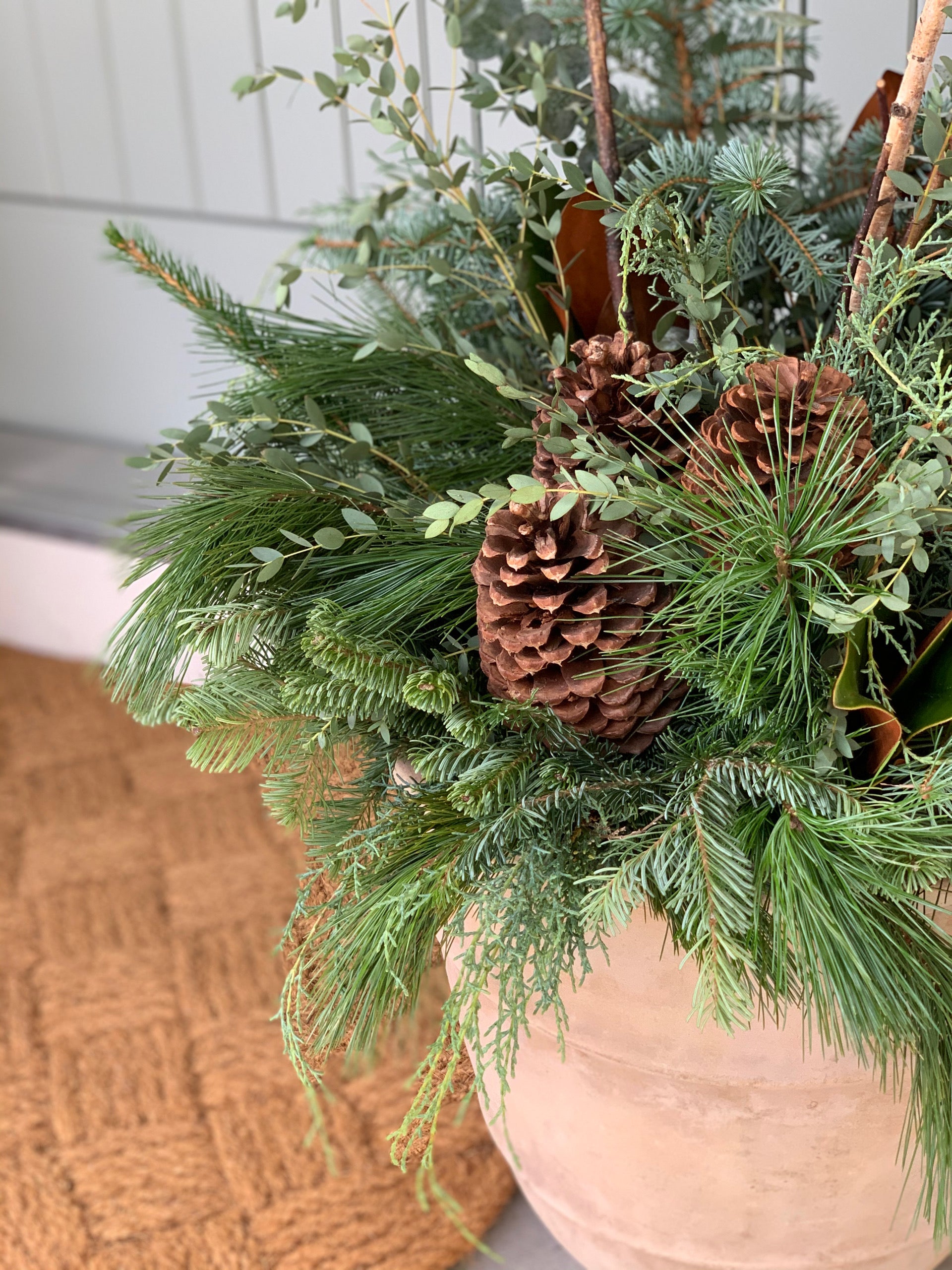 Custom Festive Greens Container Arrangement